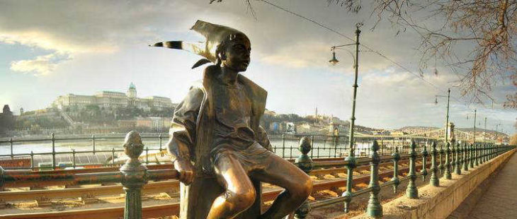 Danube and statue of a smiling child, Budapest